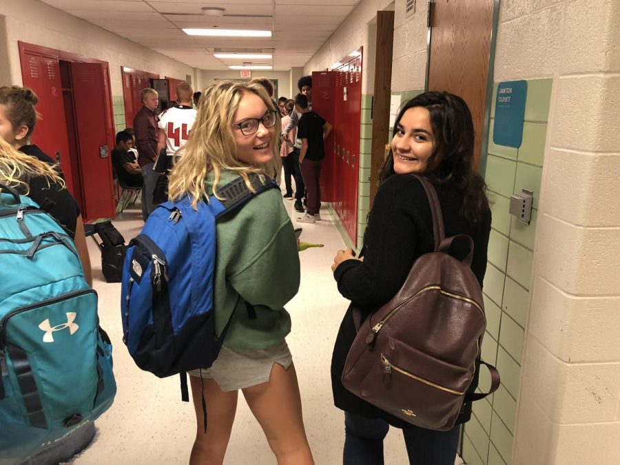 Brooklyn Filipiak and Reese Holton walk down the school halls after a long summer break.