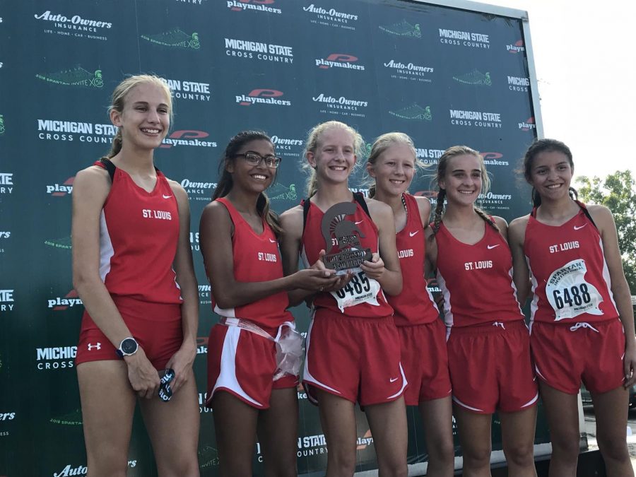 St Louis competitors pose with an award from the Spartan Invite.