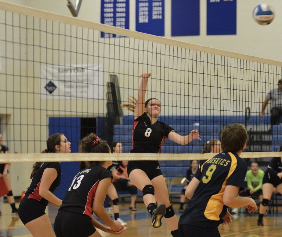 Aubrey Sherwood executes amazing athleticism on the volleyball court.