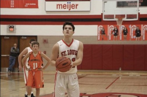 Ethan Wilson prepares to shoot a free throw.