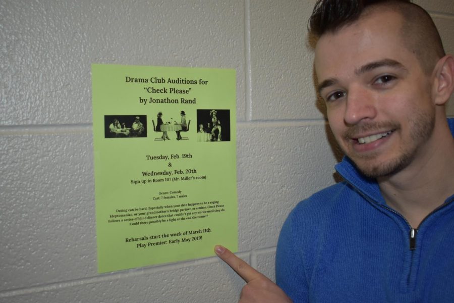 Jordan Miller shows off a flyer for the brand-new drama club.