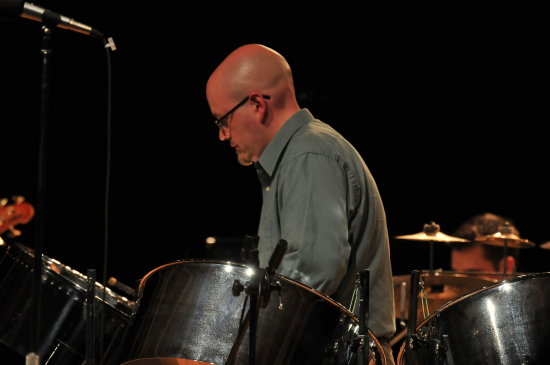 Steve Lawhorne plays the steel drums. He is also the director of the high school steel band.