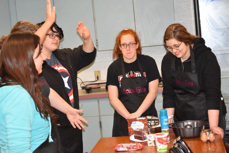 SLHS Spice Girls interact with various ingredients and things.