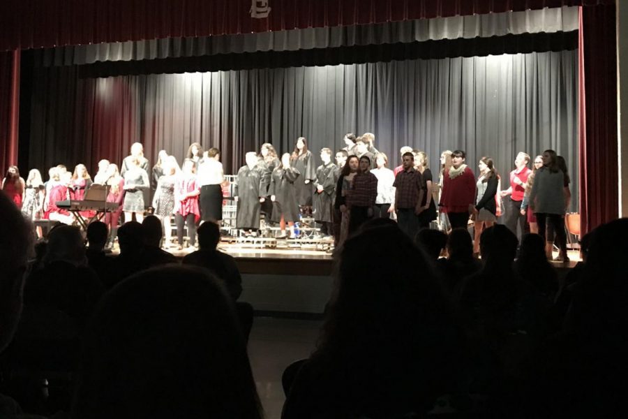 The St. Louis High School Choir performs alongside the middle school choir.