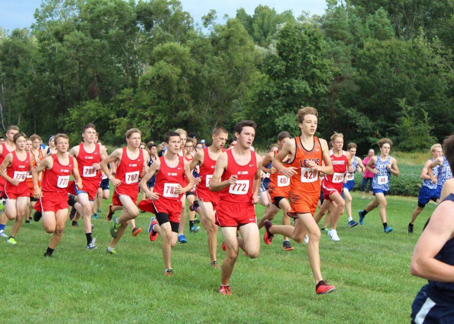 The boys varsity starts the race as a pack.