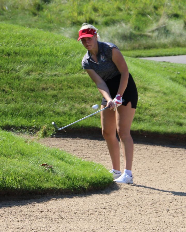 Chloe Baxter works her way out of a sand trap.
