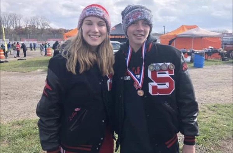 Munderloh (left) and March (right) celebrate as they both received all-state honors.