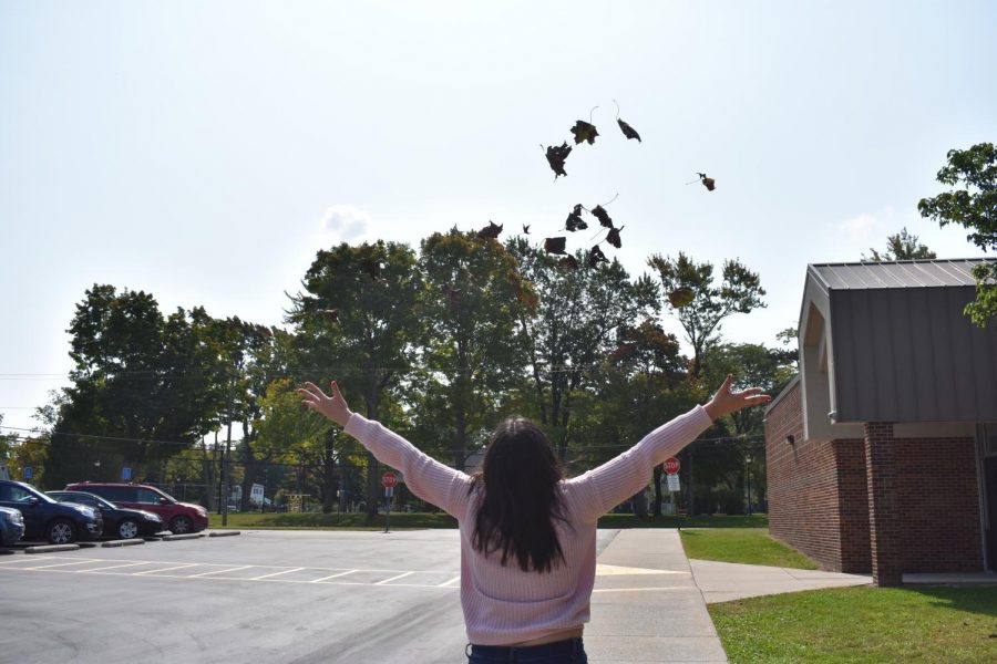 An SLHS student is excited about fall and the sweater fashion.