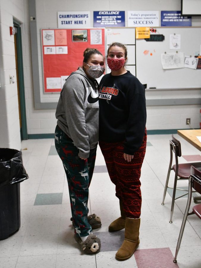 Delainee Zacharko and Macie Salladay participate in Pajama Day.