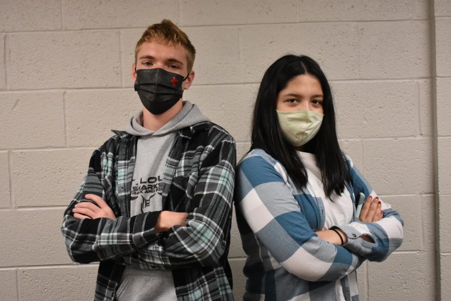 Keegan Honig (left) and Maria Puga-Trevino (right) show off their flannels 