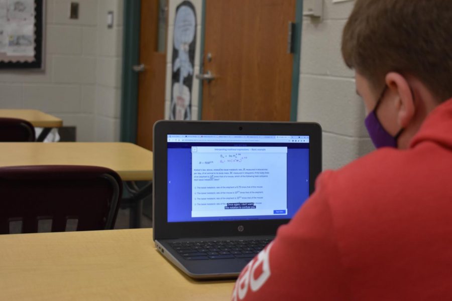 A student practices for the SAT by utilizing Khan Academy.