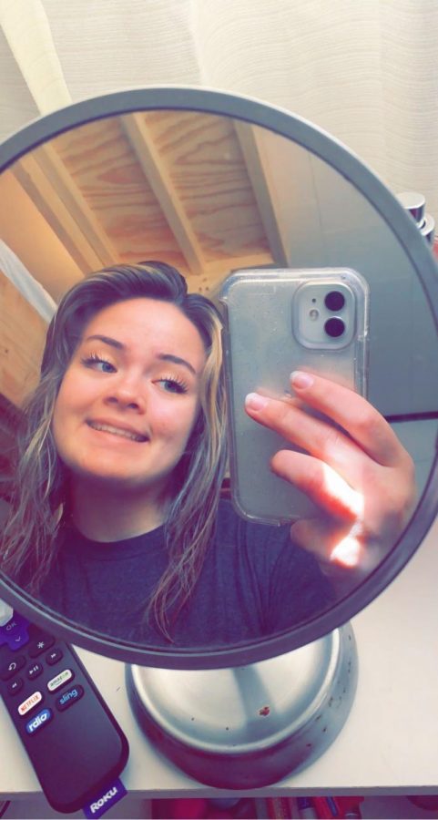 Danielle Luft shows her self-confidence by taking selfies. 