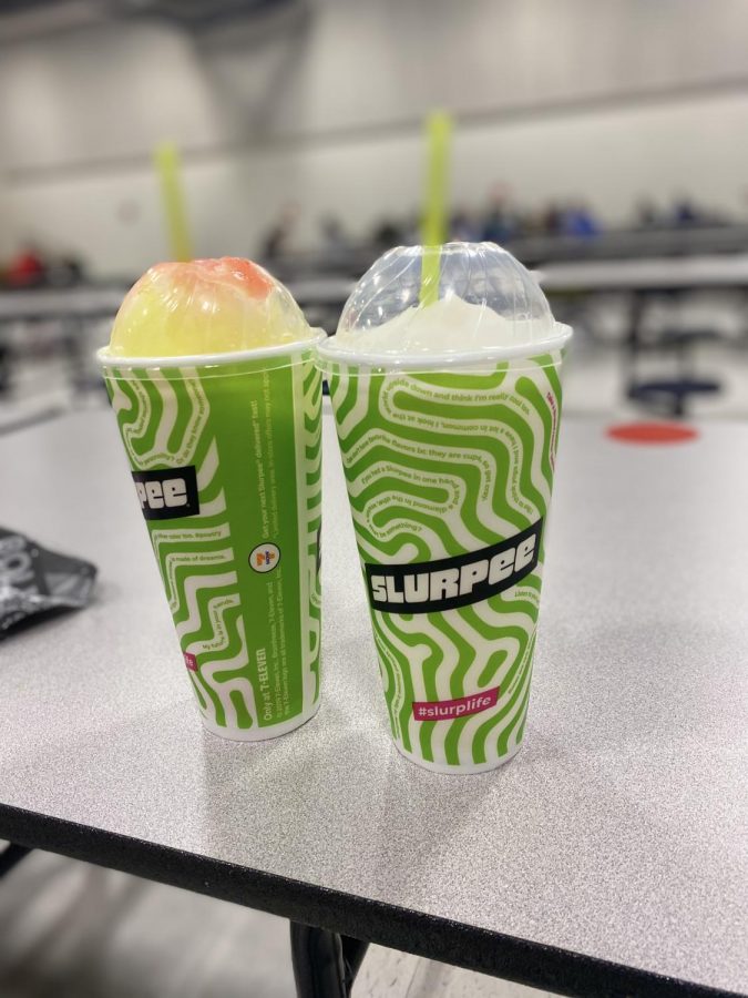 Students compare different Slurpee flavors.