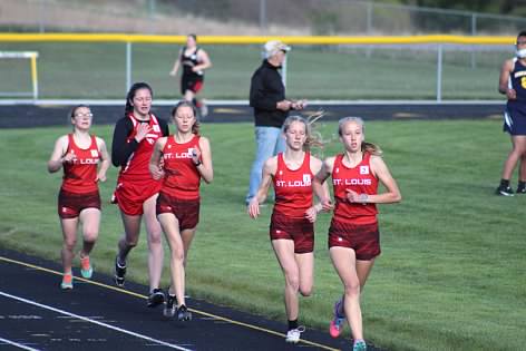 Boys and girls St. Louis track teams ran on the Standish-Sterling track.