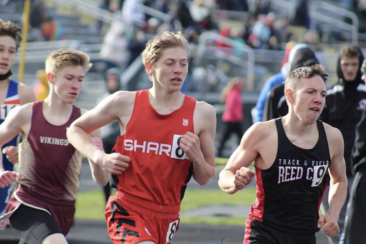 Nate March ran a season best in the 1600 to help the Sharks take first place at the meet.