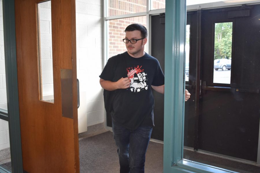 Grant Bebow walks in the doors for the first day of school. 