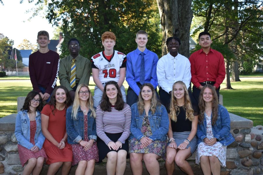 St. Louis High School  Homecoming court of 2021-22 pose for a group photo all together.