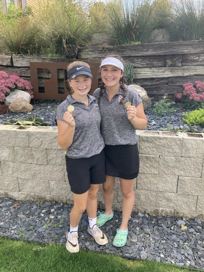 Natalee Hoyt and Josie Schrot pose with their metals after taking third at the Alma Panther Classic. 