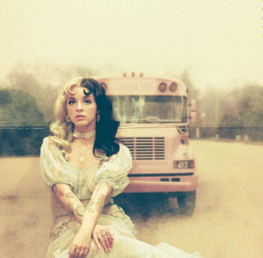 Melanie Martinez poses with the bus that was featured in K-12 film.