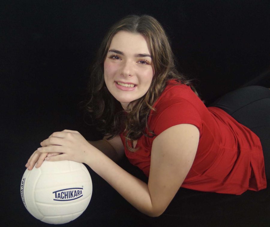 Korah+Honig+poses+for+her+senior+pictures+in+her+SLHS+volleyball+uniform+as+she+prepares+to+say+goodbye+to+high+school.+