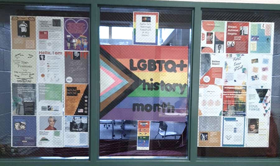 GSA brings awareness to LGBTQ+ month by decorating with a display of multiple informational posters that were put up by the library. 