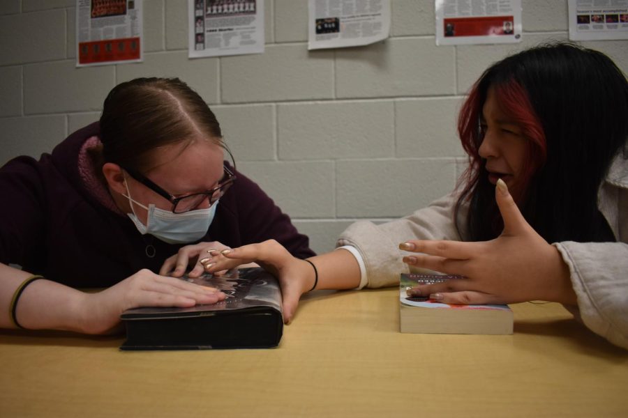 Two students at SLHS, who love reading, begin to argue over if hardcovers are better than paperbacks.