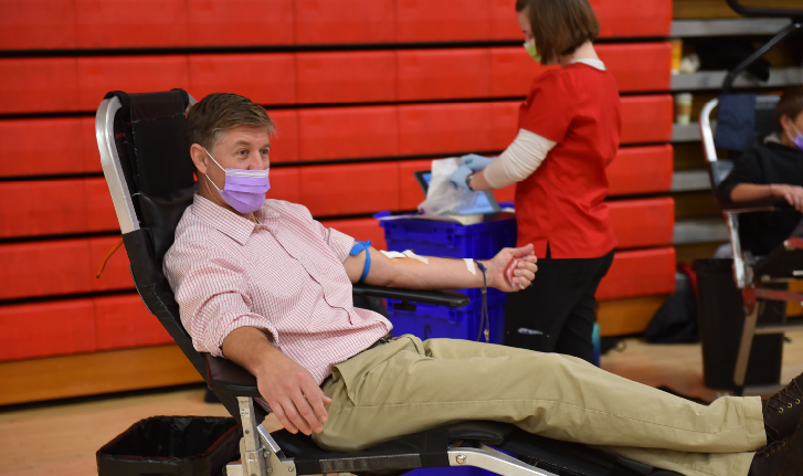 SLHS Staff Member, Kevin Kuhn gets his blood drawn.