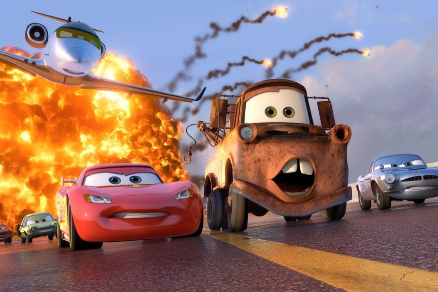 Lightning McQueen (left), Tow Mater (middle), and Finn McMissile (right) outrun a few pursuing lemons.