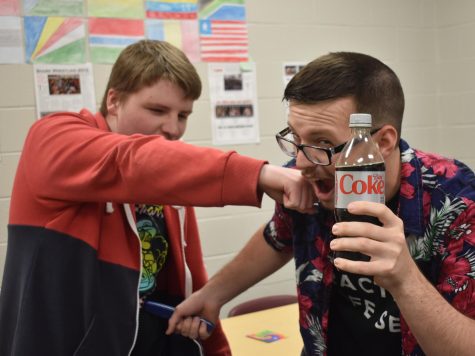 Two St. Louis students fight over whether the bottle of Coke is called soda or pop. 