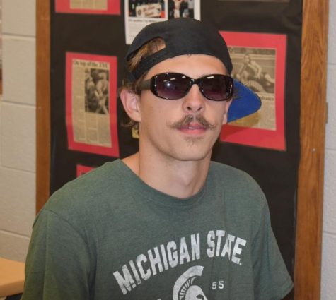 St. Louis student show cases his facial hair.