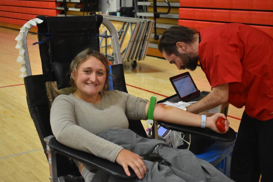Jacie Burnham sits in the chair as she gets ready to donate blood. 