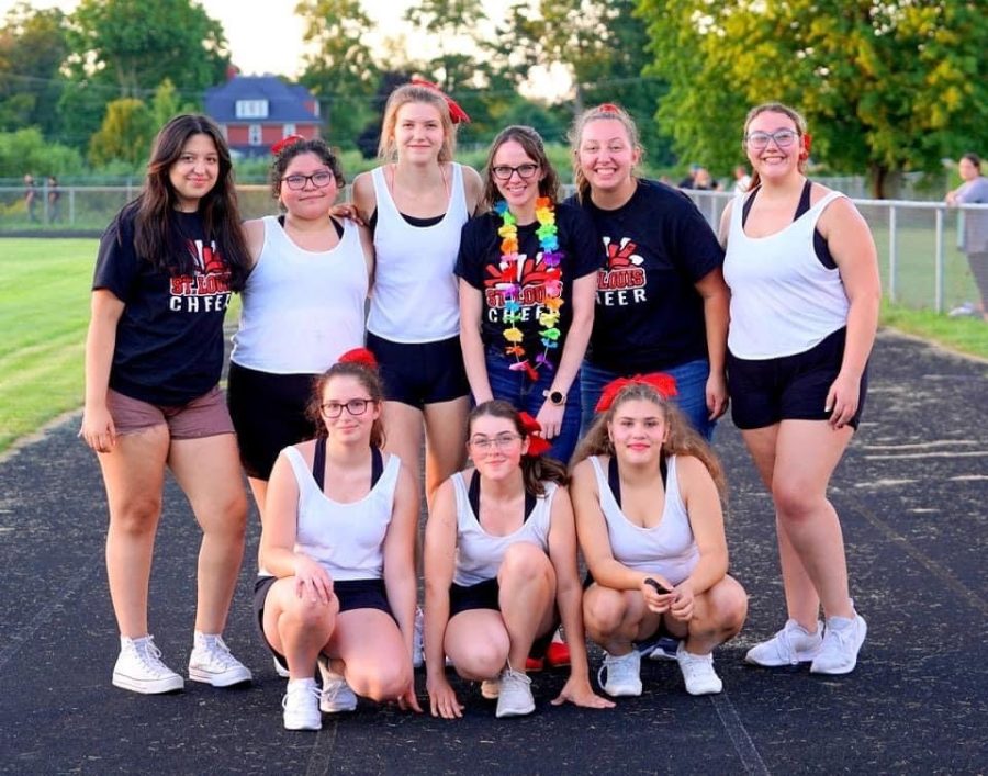 SLHS Varisy Cheer Team poses for Hesperias local newspaper as they take a photo of the team.