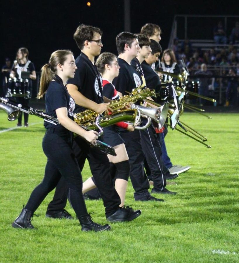 This picture highlights SLHS marching band, as they cross the field during their performance. 