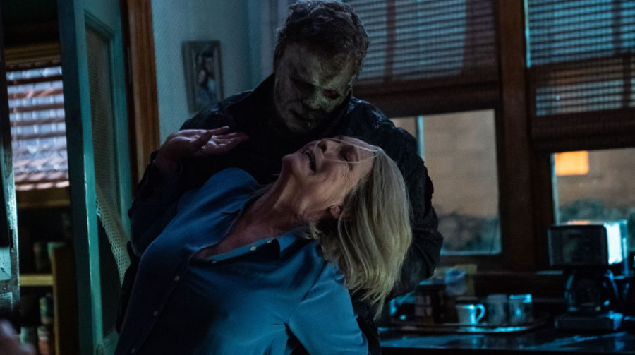 The Shape attacks Laurie Strode within her own home.