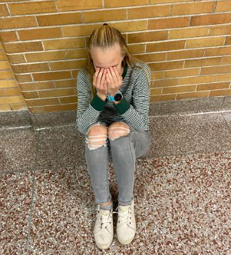 An SLHS student wallows in her own pity.
