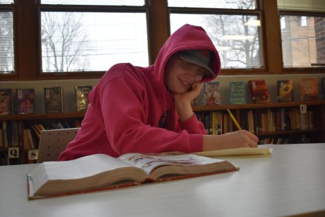Freshman, Scotty Russell, studies hard as he feels the stress of exams.