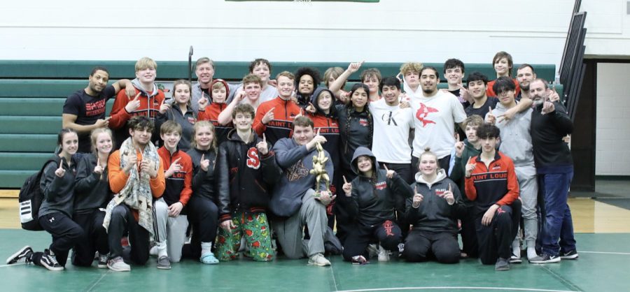 SLHS Wrestling team poses together after their big win!