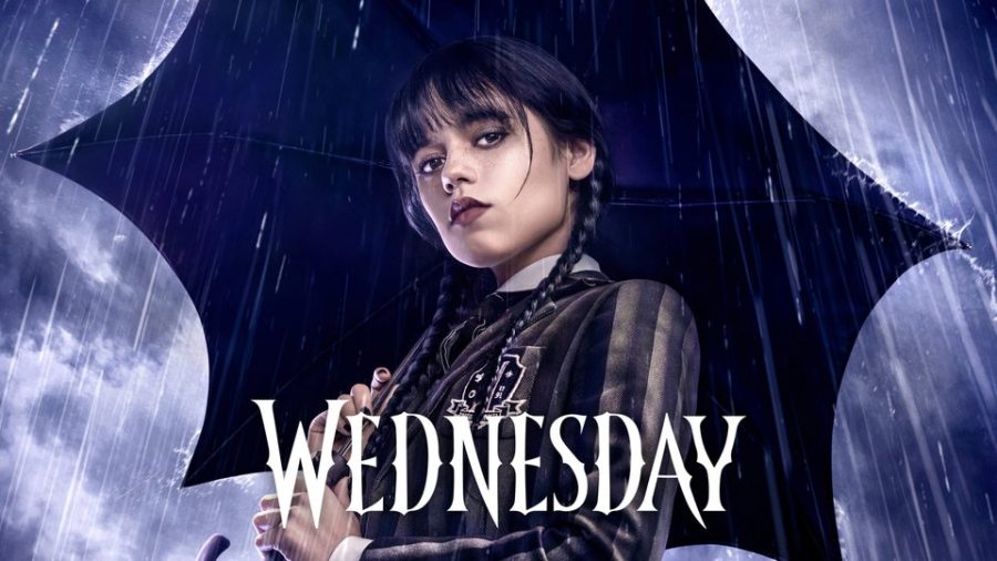 Wednesday+Addams+stares+ghastly+into+the+distance.
