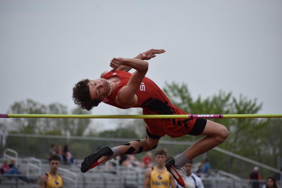 Sophomore+Trenton+Farkas+launches+himself+through+the+air+during+his+high+jump+event