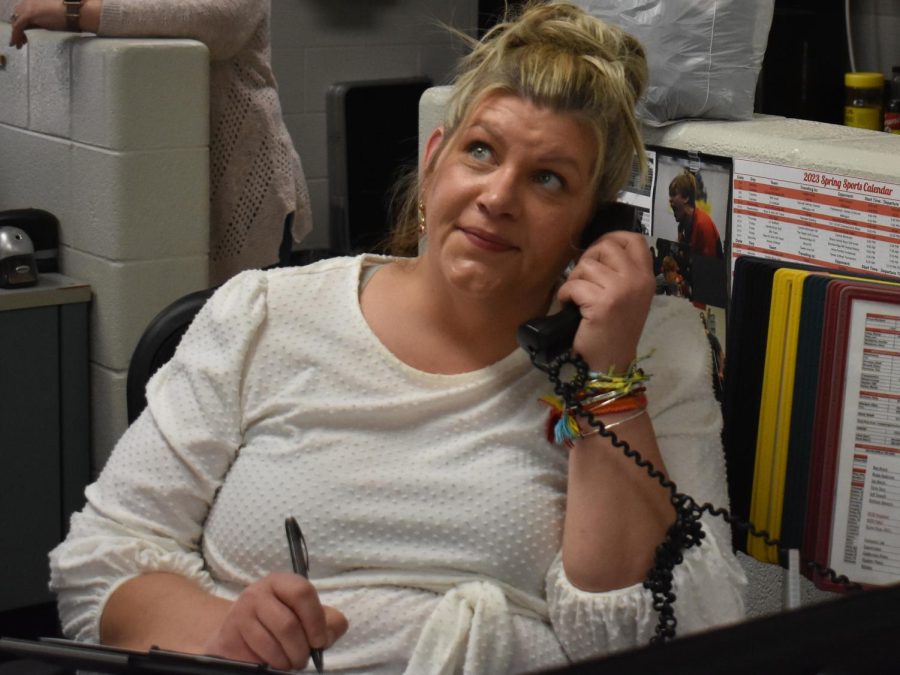 Mrs. Russell takes on yet another call as she begins to multi-task her way through the day. 