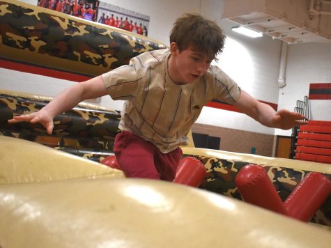 Laythan Haworth captured jumping over a part of the obstacle course that was set up by the National Guard. 