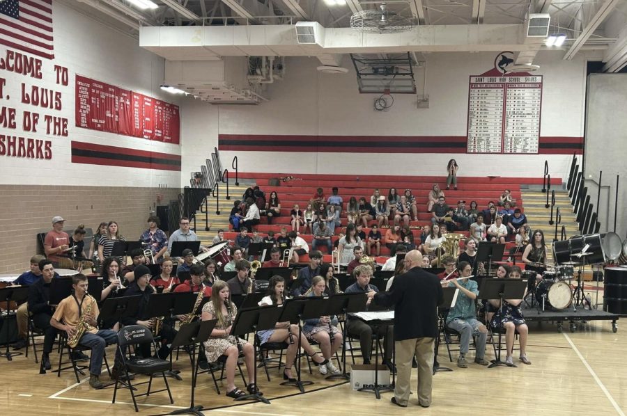 The St. Louis High School concert band prepares to play their final concert of the year