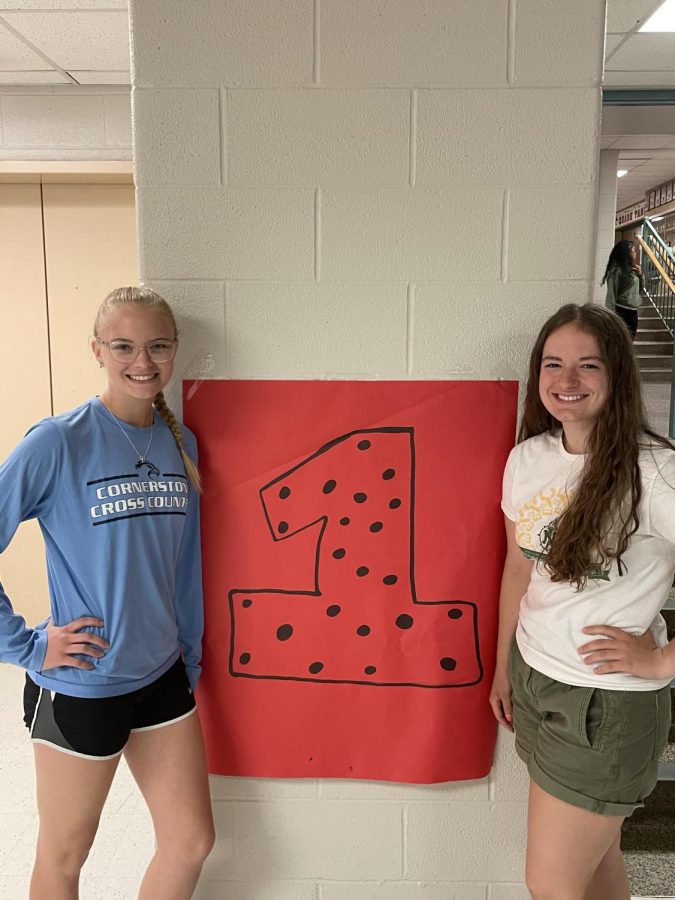 Senior Valedictorian and Salutatorian Jenna Abell and Laney Pestrue meet to celebrate the end of their high school careers