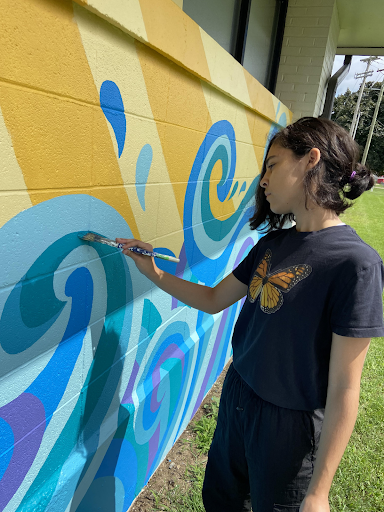 Junior Kaya Munoz puts some finishing touches on her hard work.