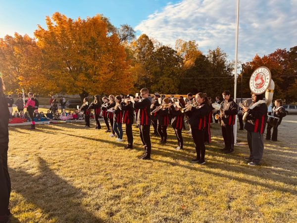 The marching band performs for Carrie Knause in the October sunshine!