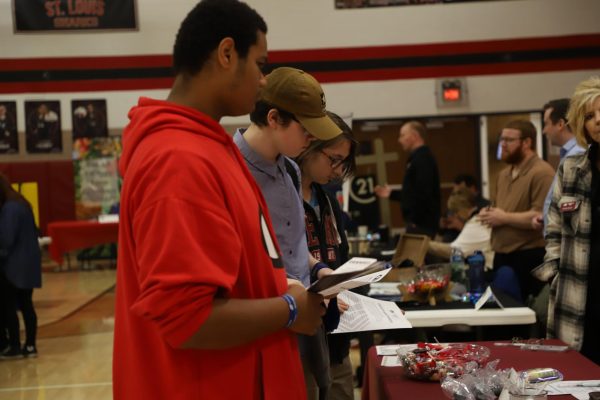 A group of sophomores learn more about Commercial Bank during the career portion of the College and Career fair.
