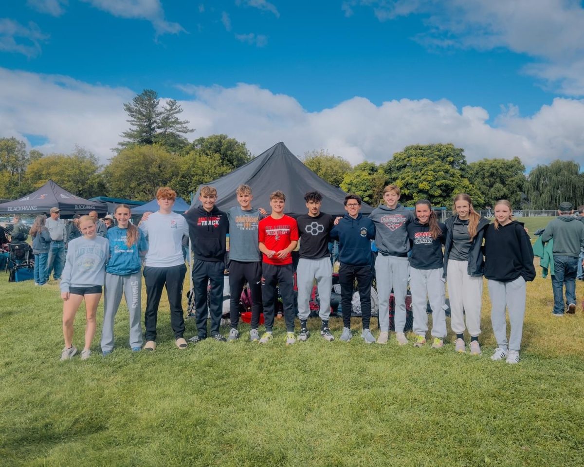 The Cross Country teams pose for a photo before racing in the Bath Invitational!