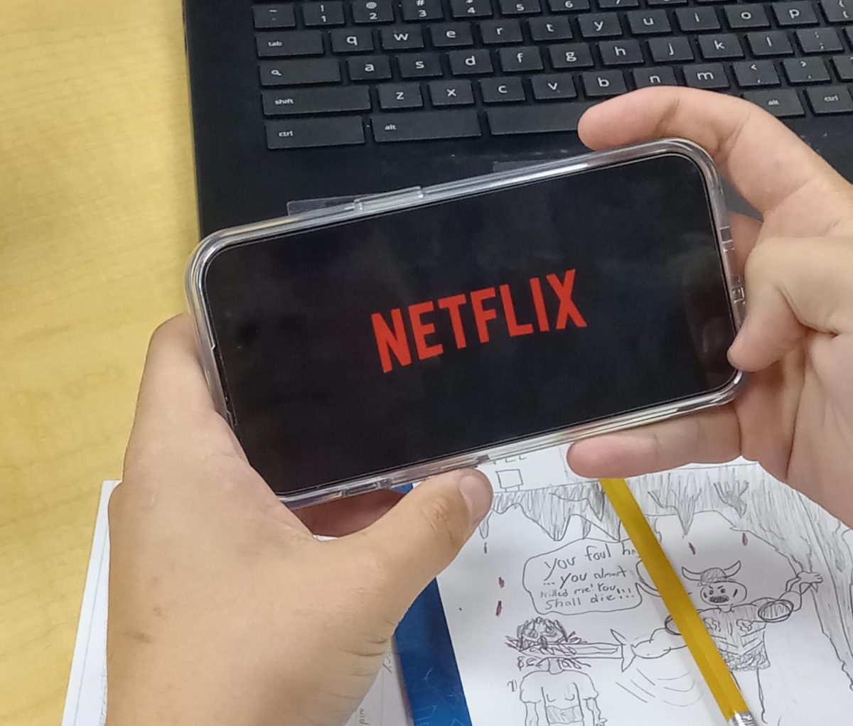 One student watches a movie on their favorite streaming platform, Netflix.