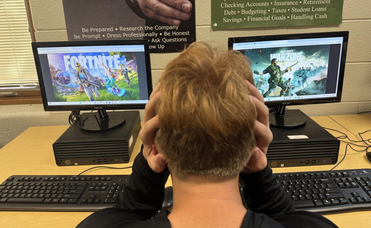 Sophomore Remington Snyder tries to decide what the superior video game is: Fortnite or Call of Duty.