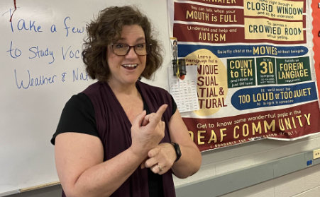 Mrs. Winright excitedly teaches ASL to her eager students!